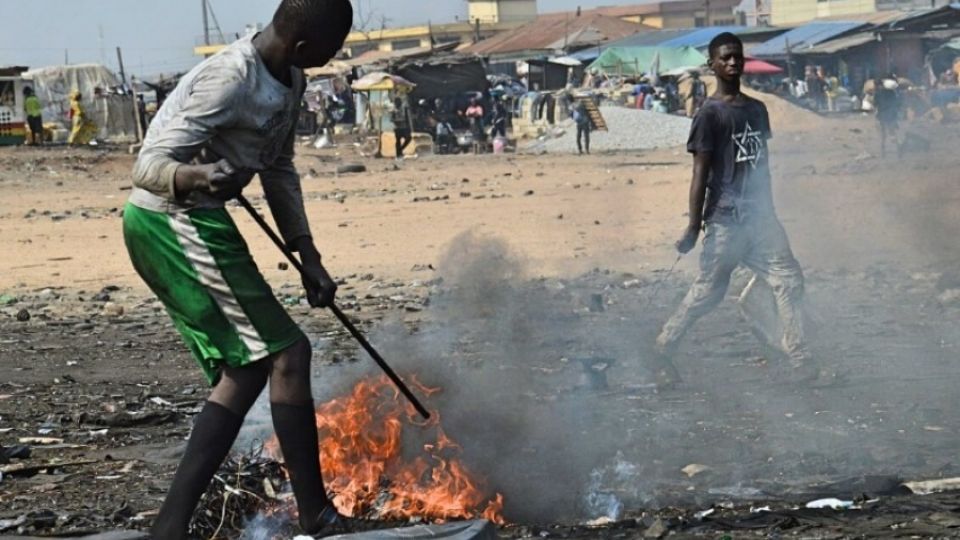 Toxic life of scrappers – burning e-waste and bashing car parts at Agbogbloshie